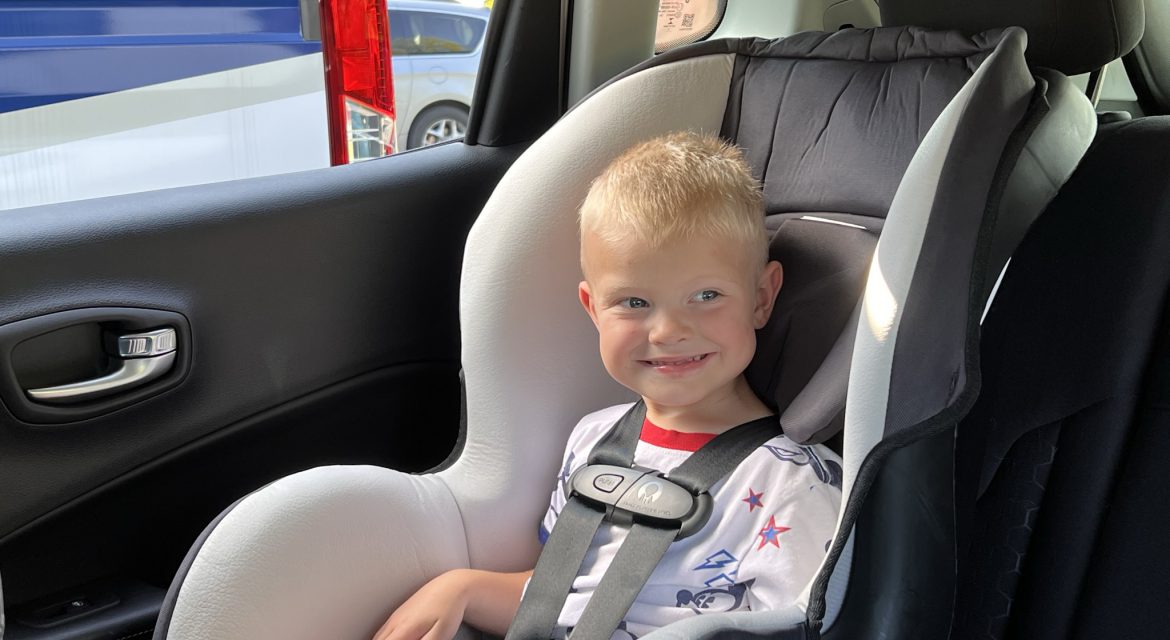 Child sitting in car seat